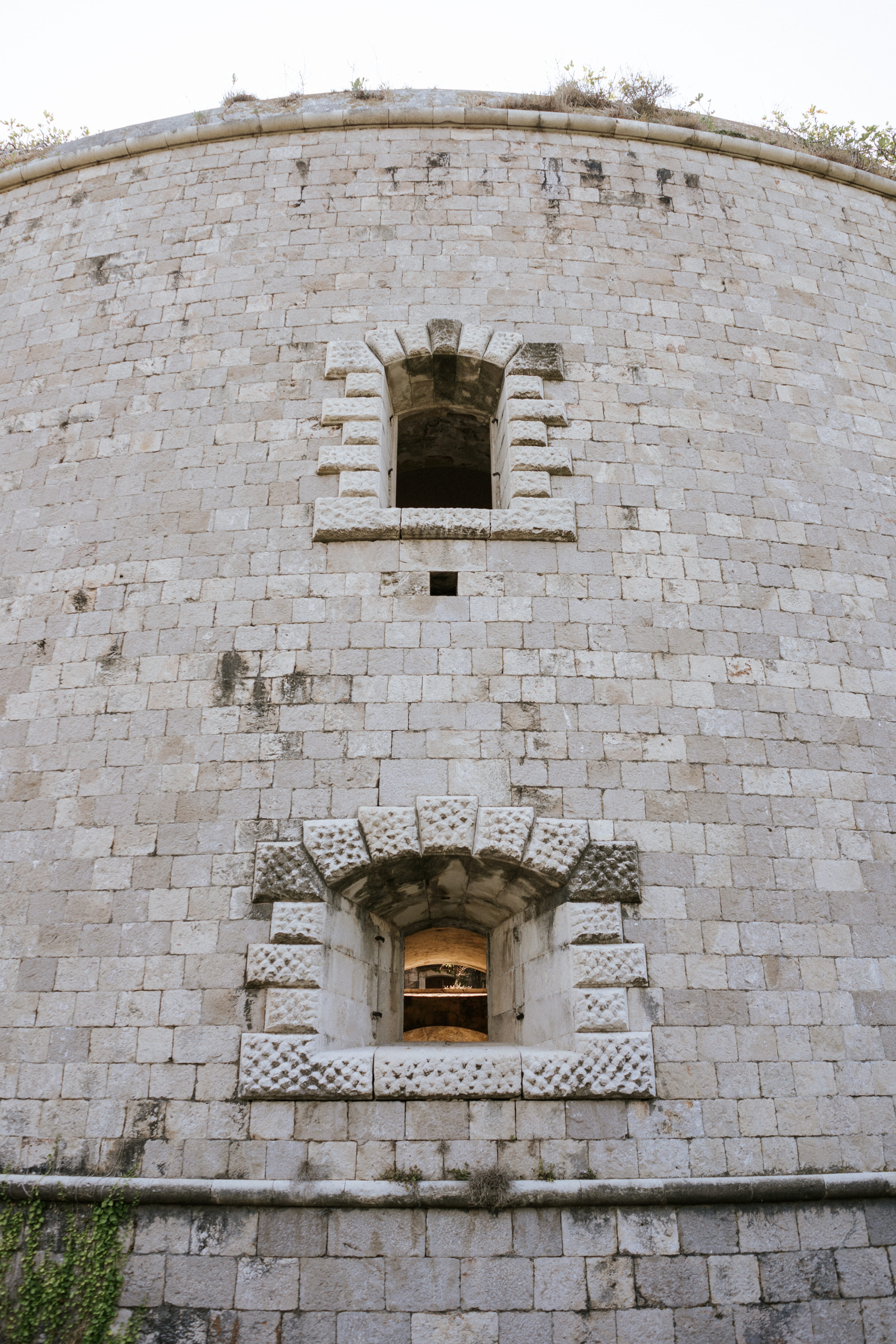 Stone building clock side