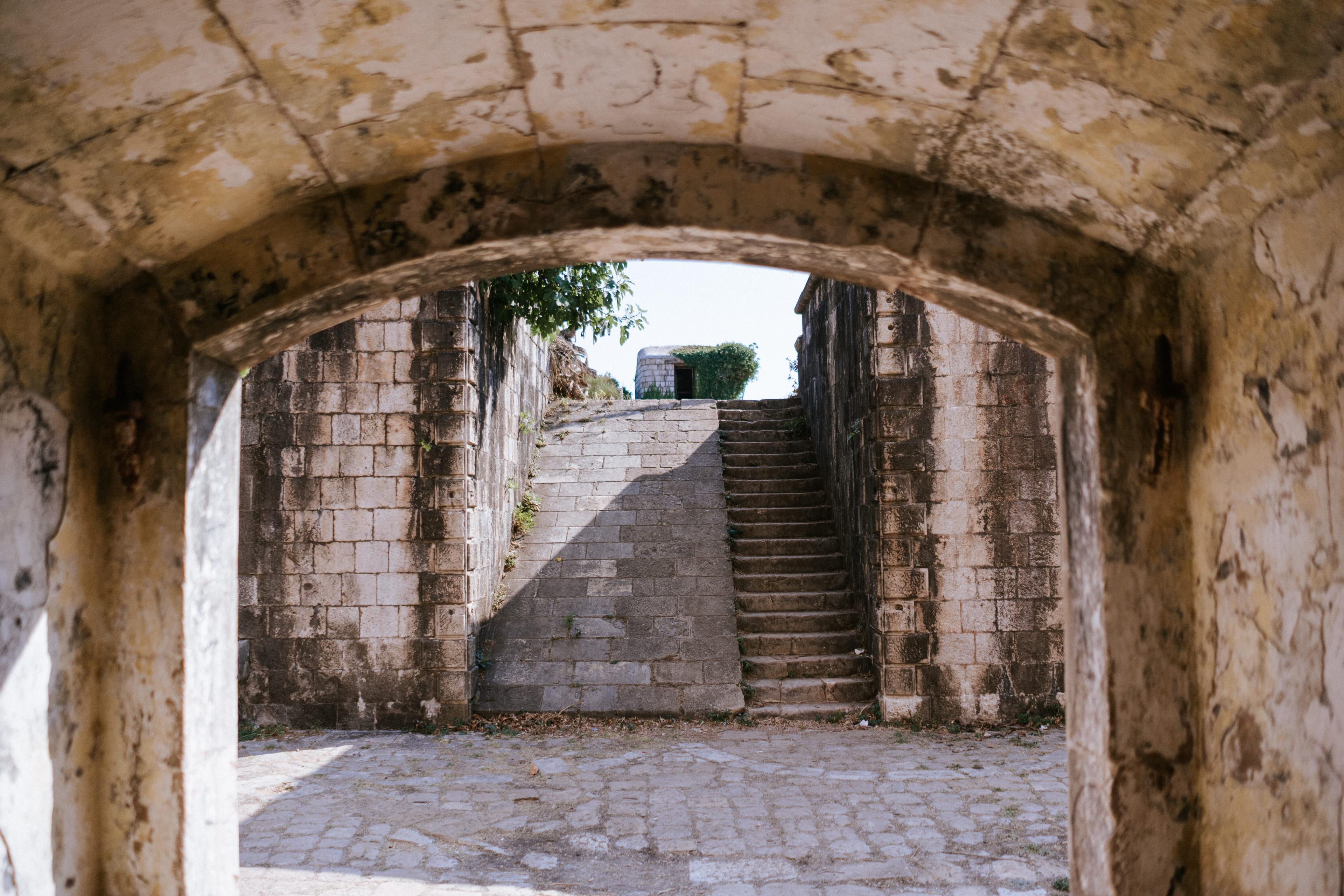 Stone building through archway