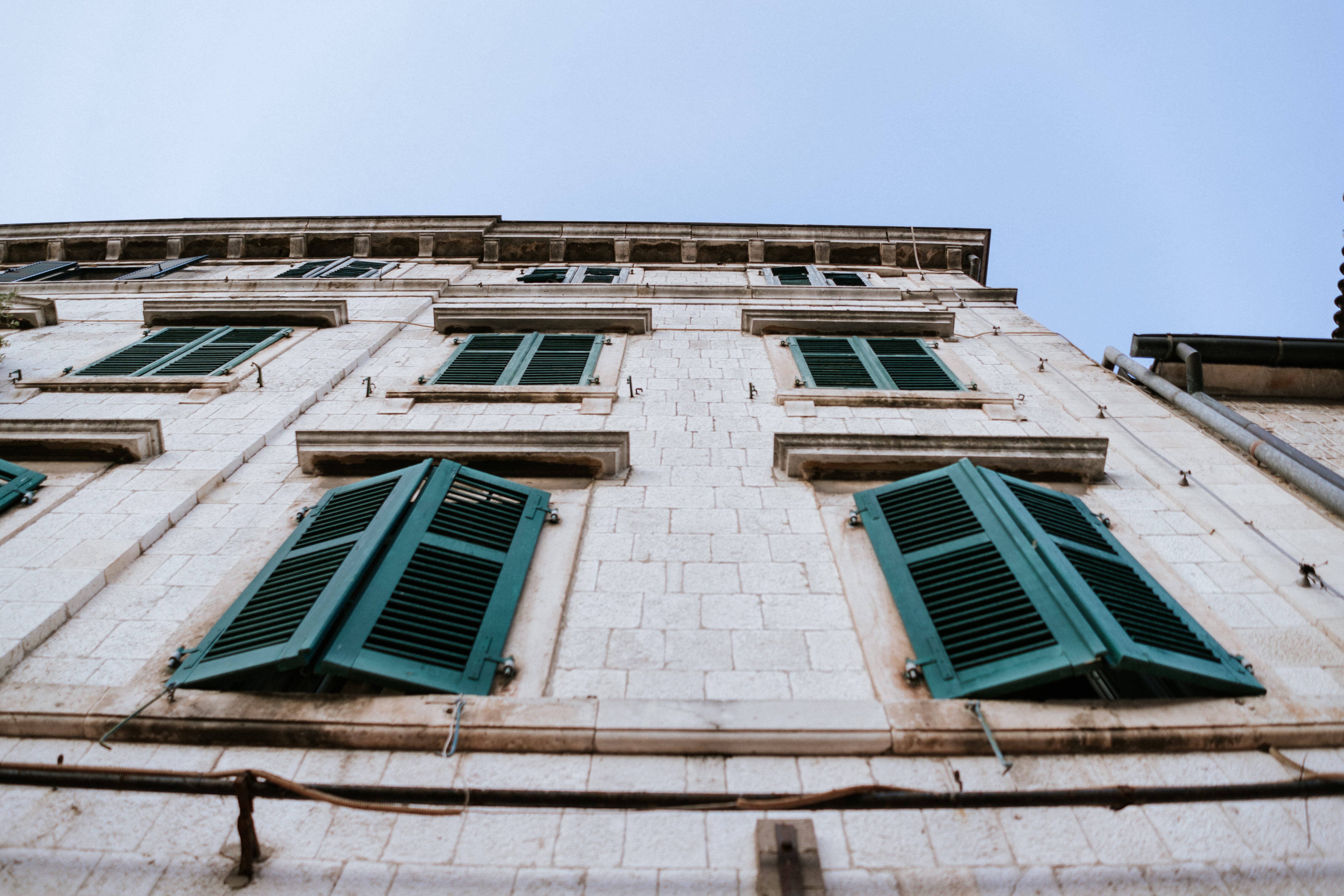 Tall building green shutters