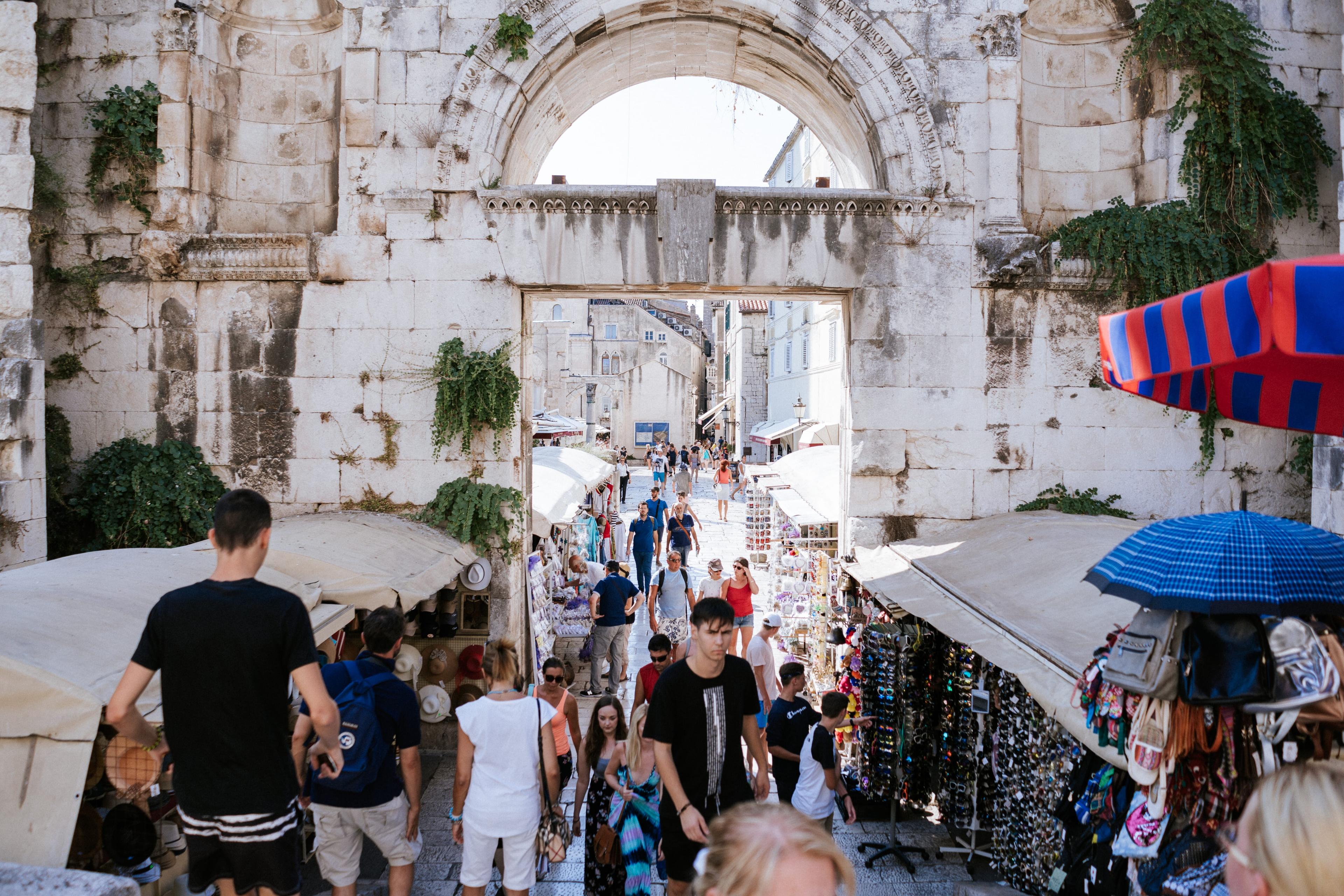 Group walking narrow street