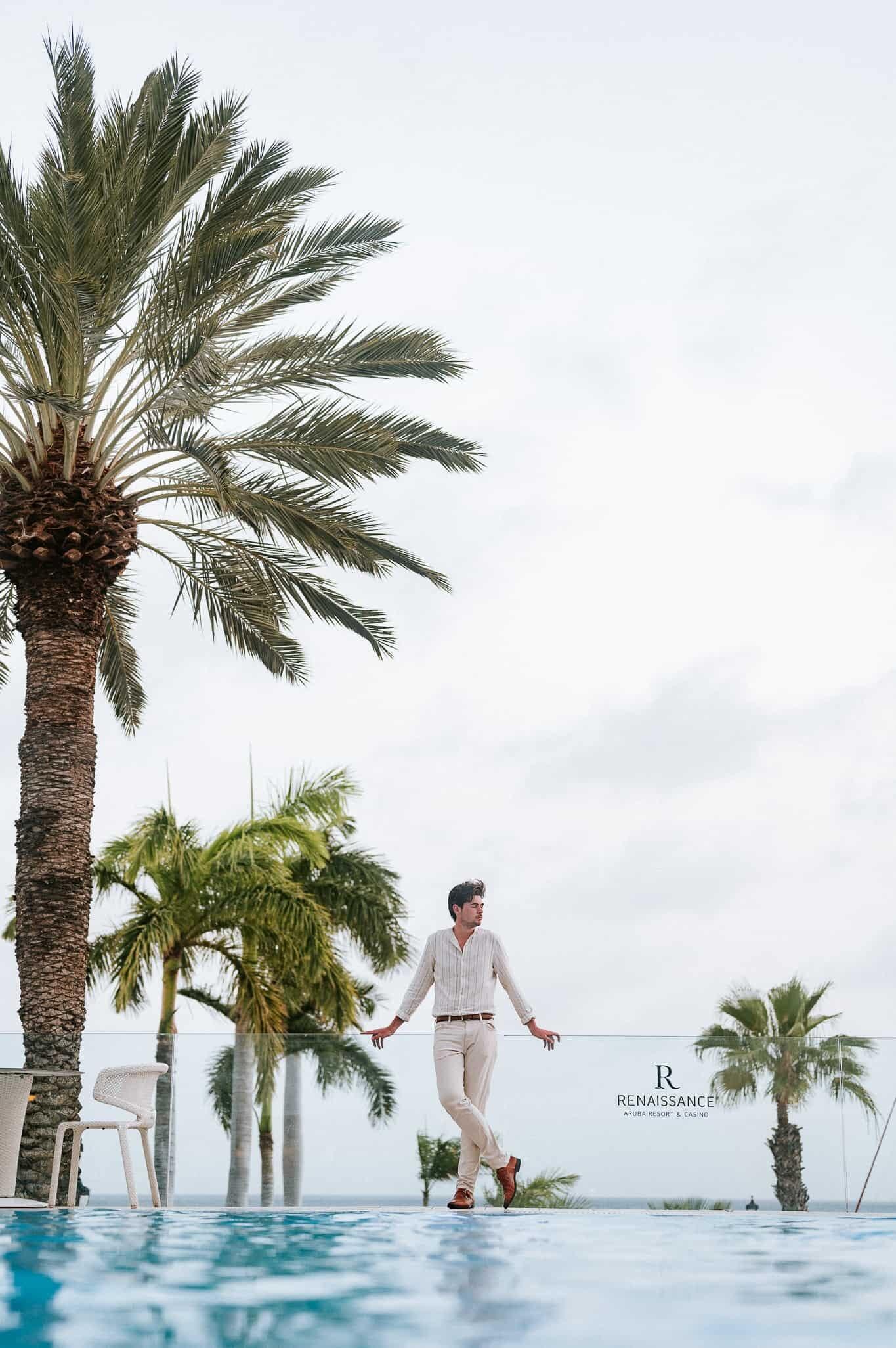 Man palm tree beach Aruba