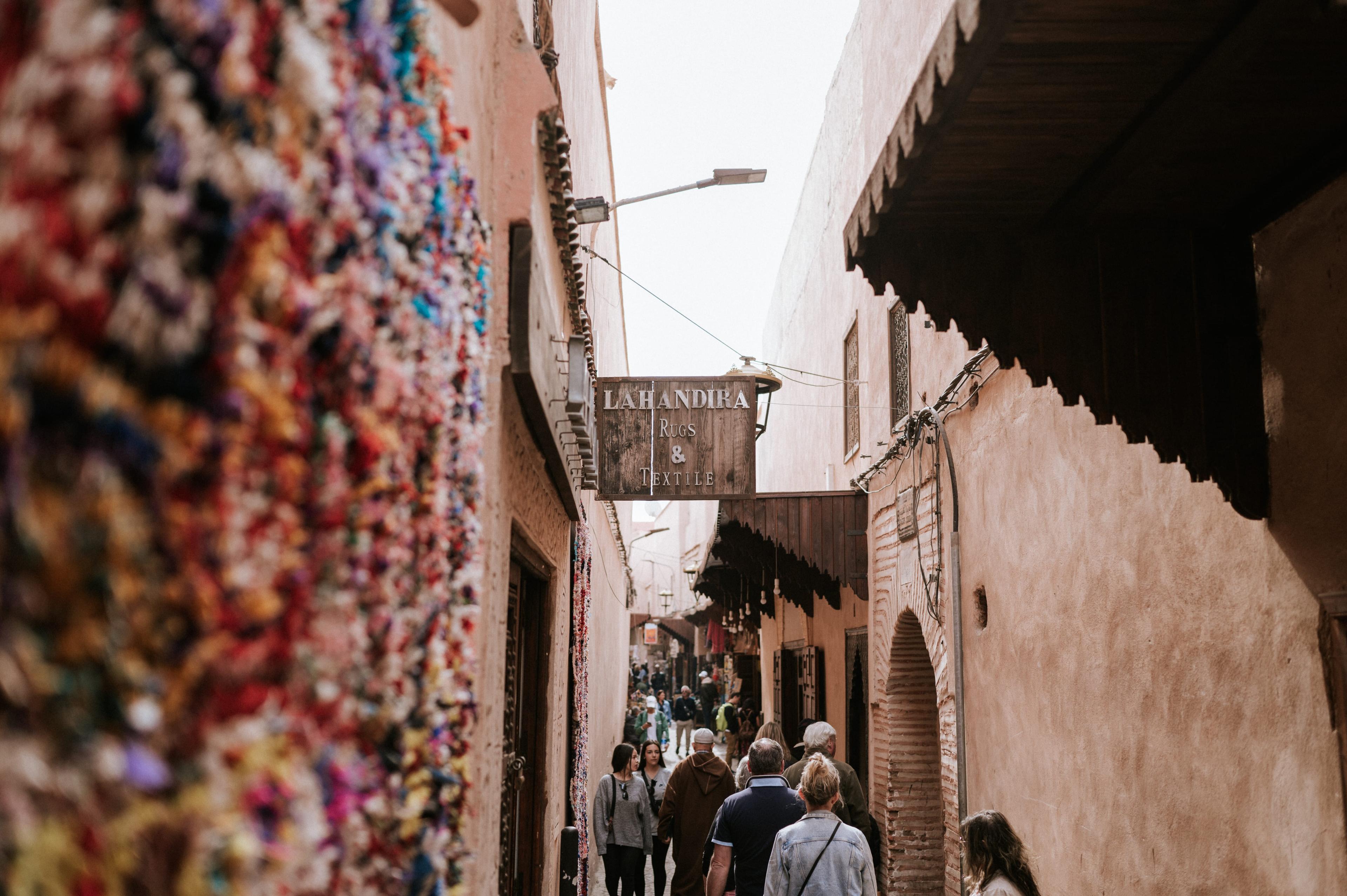 Group people walking narrow street