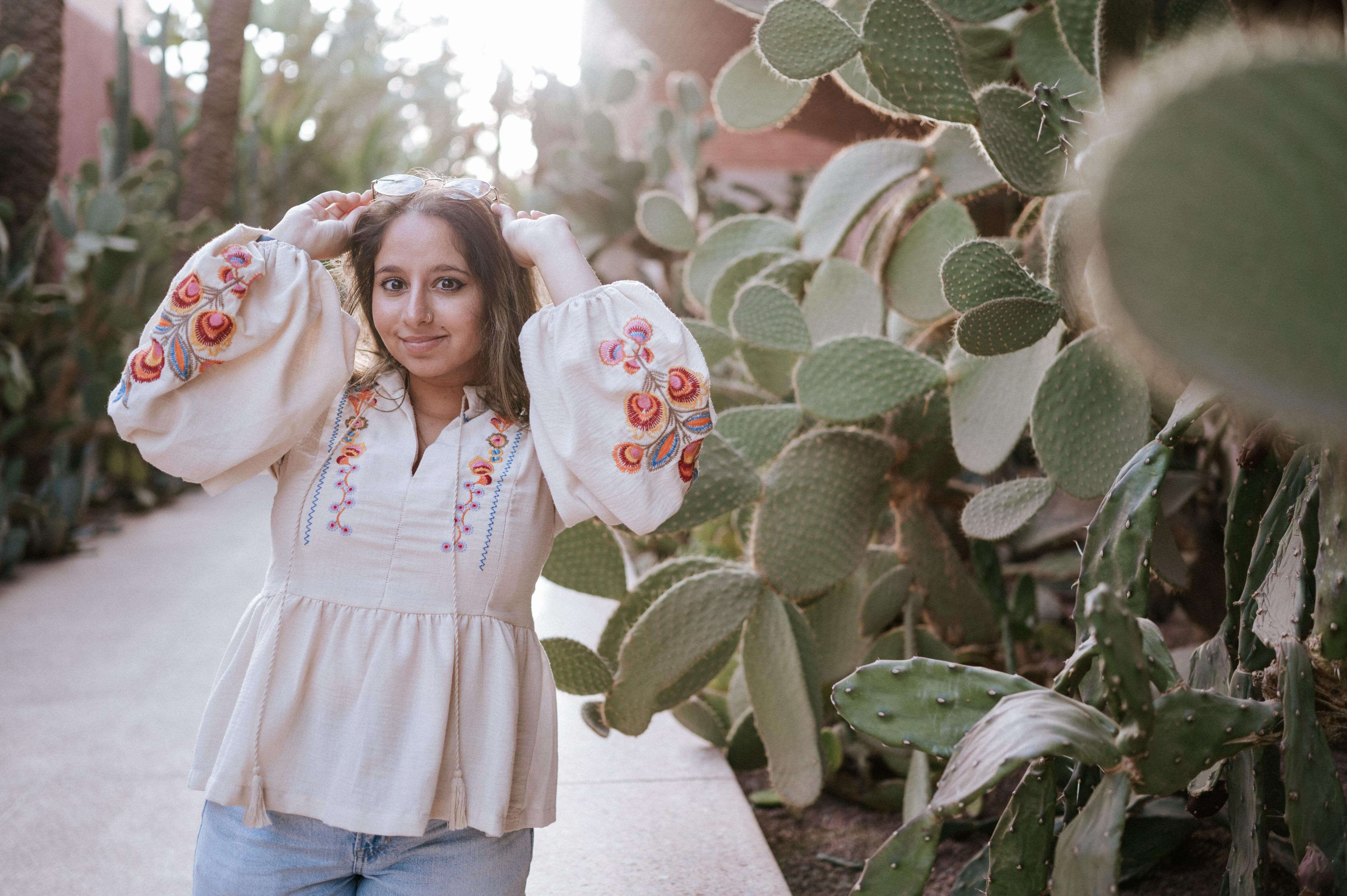 Woman white blouse blue jeans