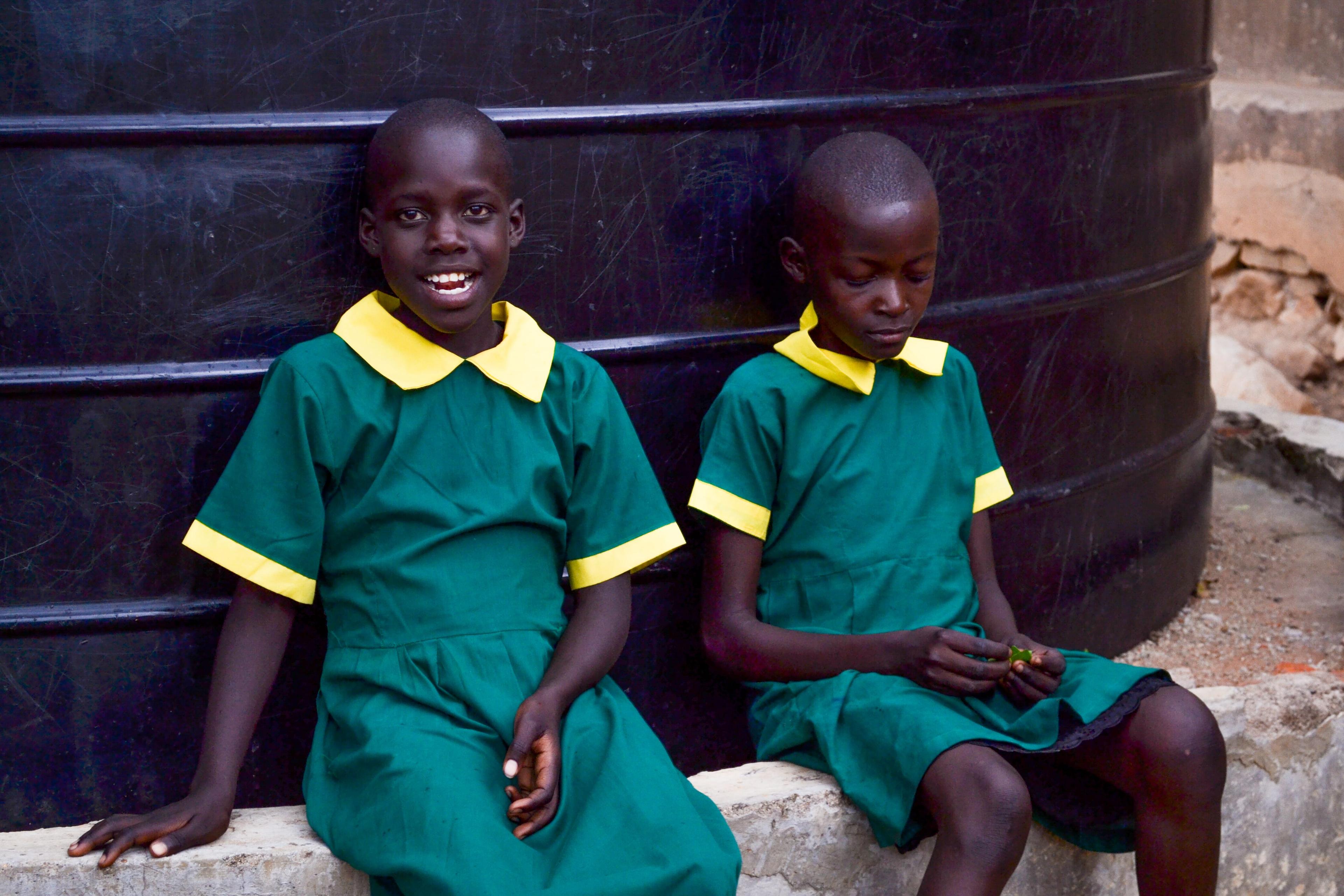 Children sitting on cistern