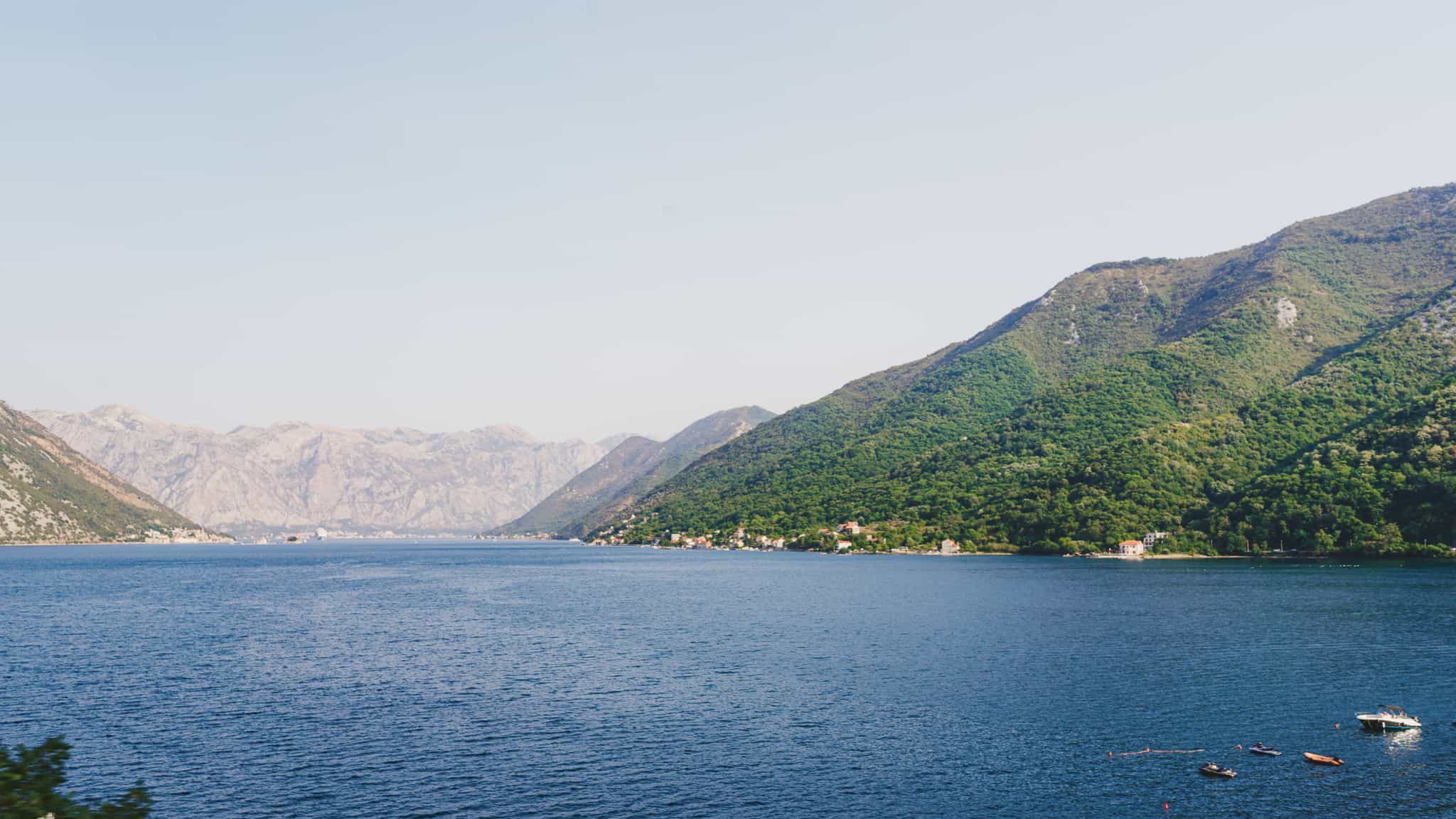Daytime shot of the Bay of Kotor and its surrounding hills and mountains of Montenegro