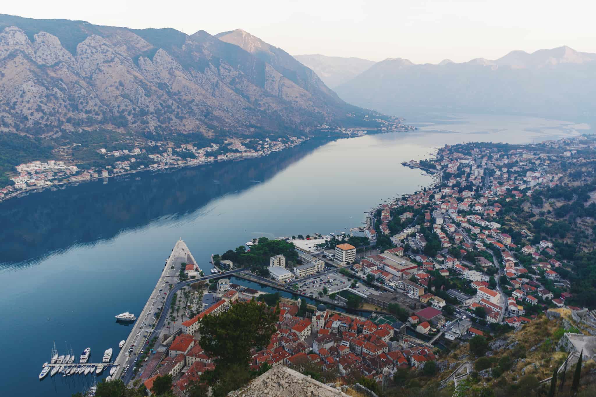 Epic landscape shot of the Bay of Kotor in Montenegro in the morning at the top of the ladder of Kotor