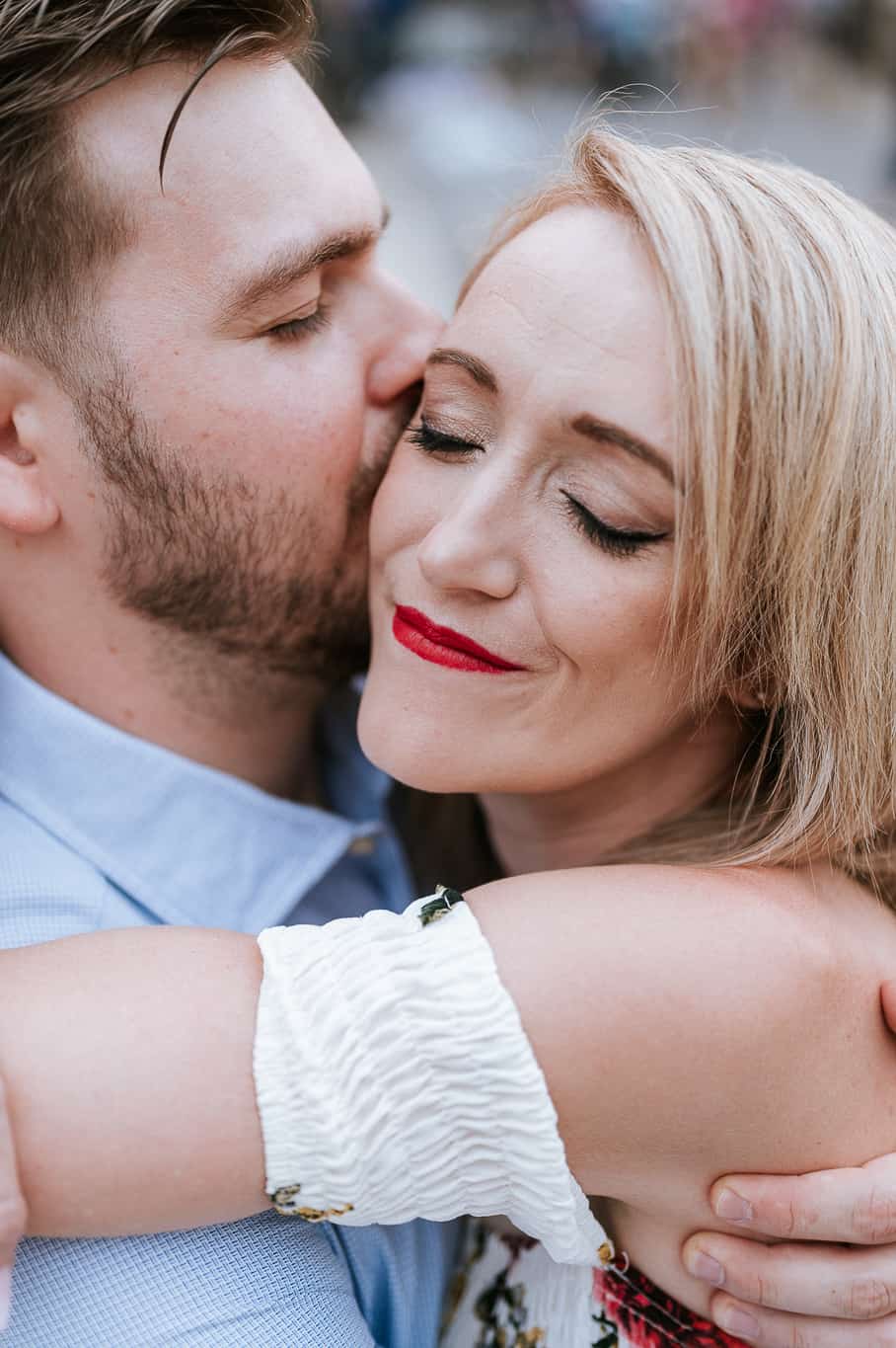 Close up of couple with eyes closed in Rome Italy During engagement photoshoot